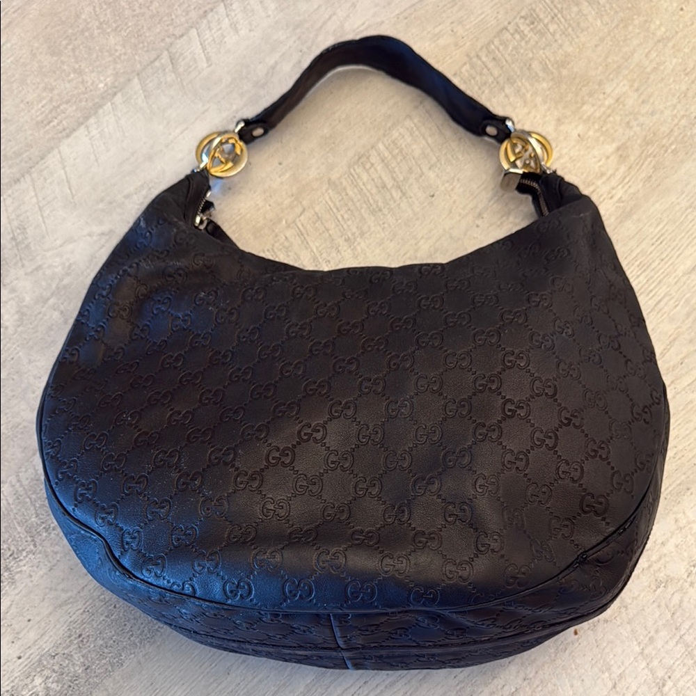 Gucci Black Hobo Bag with Gold Accents